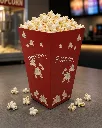 Rød popcornbæger med hvide popcorn.webp
